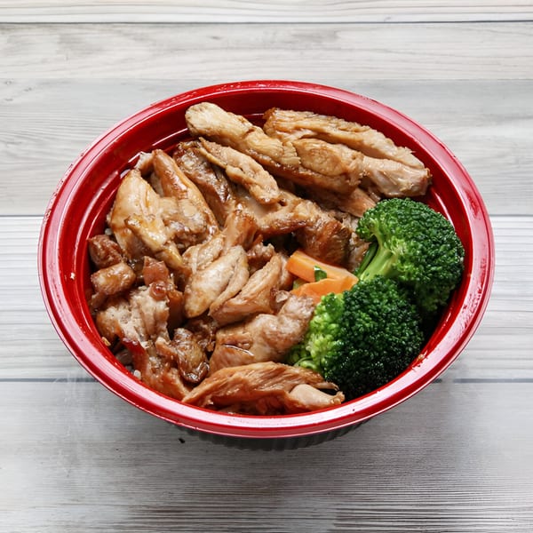 Golden China Restaurant's chicken teriyaki bowl with broccoli and carrots in a red bowl.